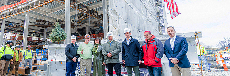 DLJ Real Estate, Deutsche Finance Group, Leggat McCall, and Shawmut Design and Construction celebrate topping off of 808 Windsor St.